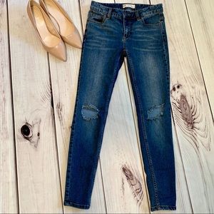 Free people busted knee skinny jeans
